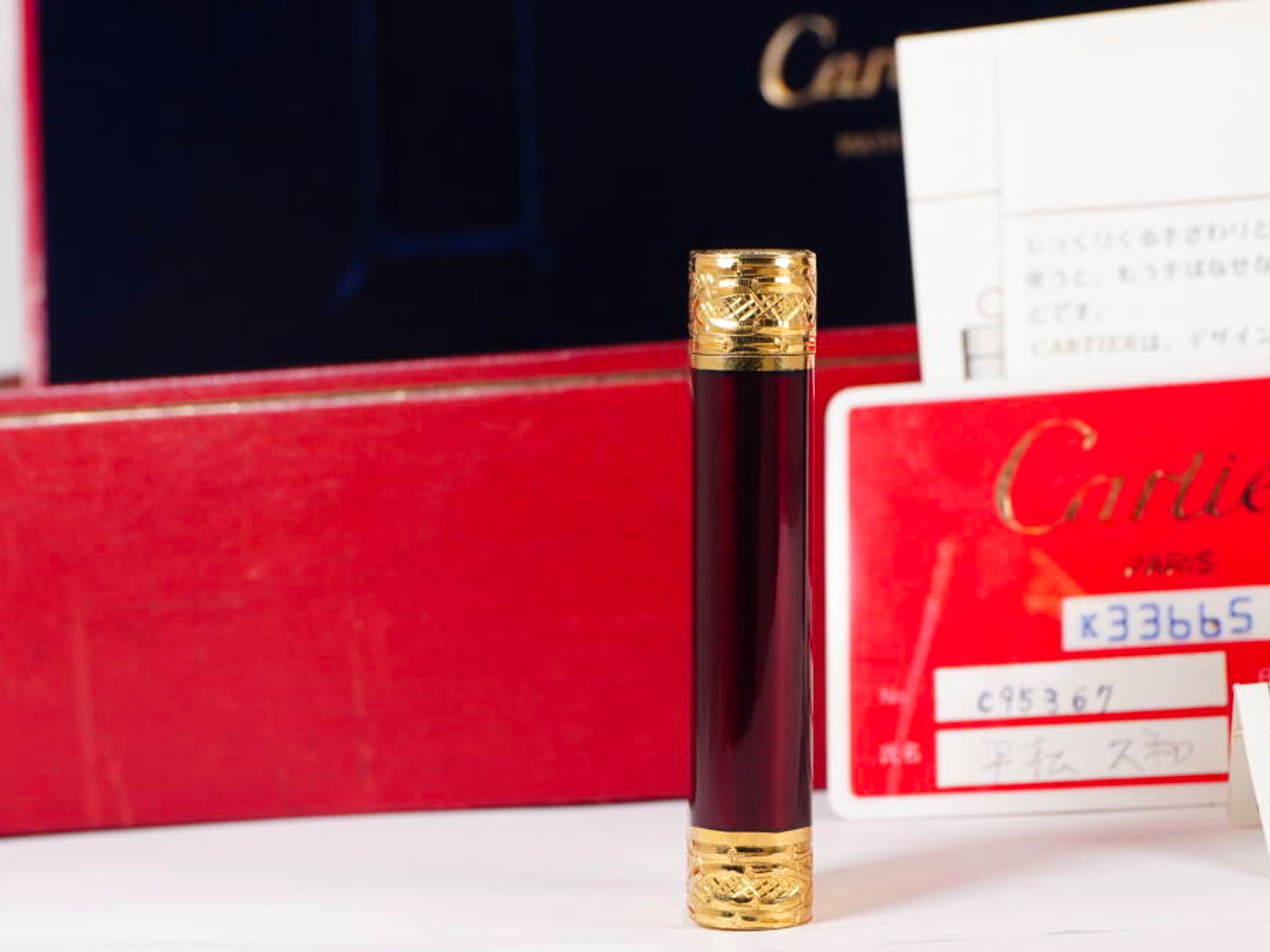 Cartier カルティエ ガスライター ゴールドカラー レッド系 18K 93.7g 箱・冊子・カード付 · plate 5